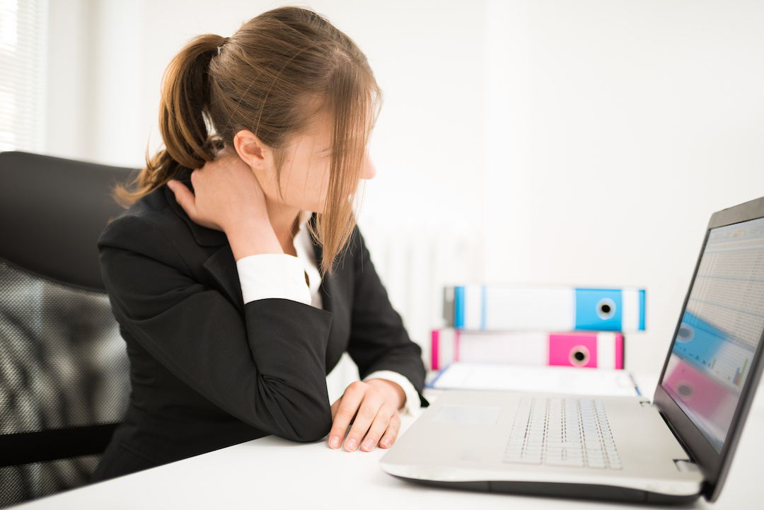 Woman suffering neck pain from bad posture